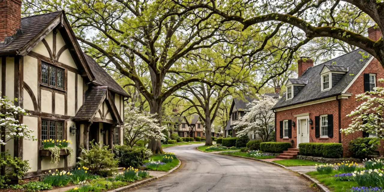 Brick Tudor Revival and Cape Cod houses on a tree-lined street